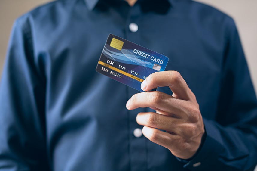 Business men use credit cards In blue